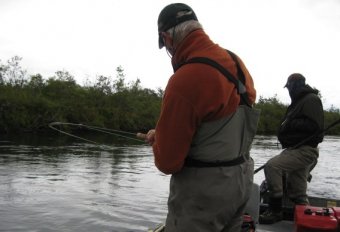 Fighting fish from a boat.